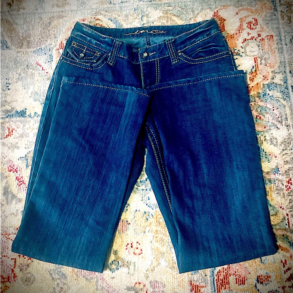 Inc, Denim women’s jeans with detailed pockets.